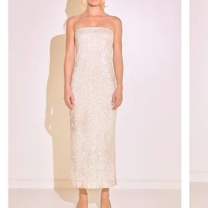 EndlessRose white sequin dress.Absolutely stunning!I wore to my rehearsal dinner